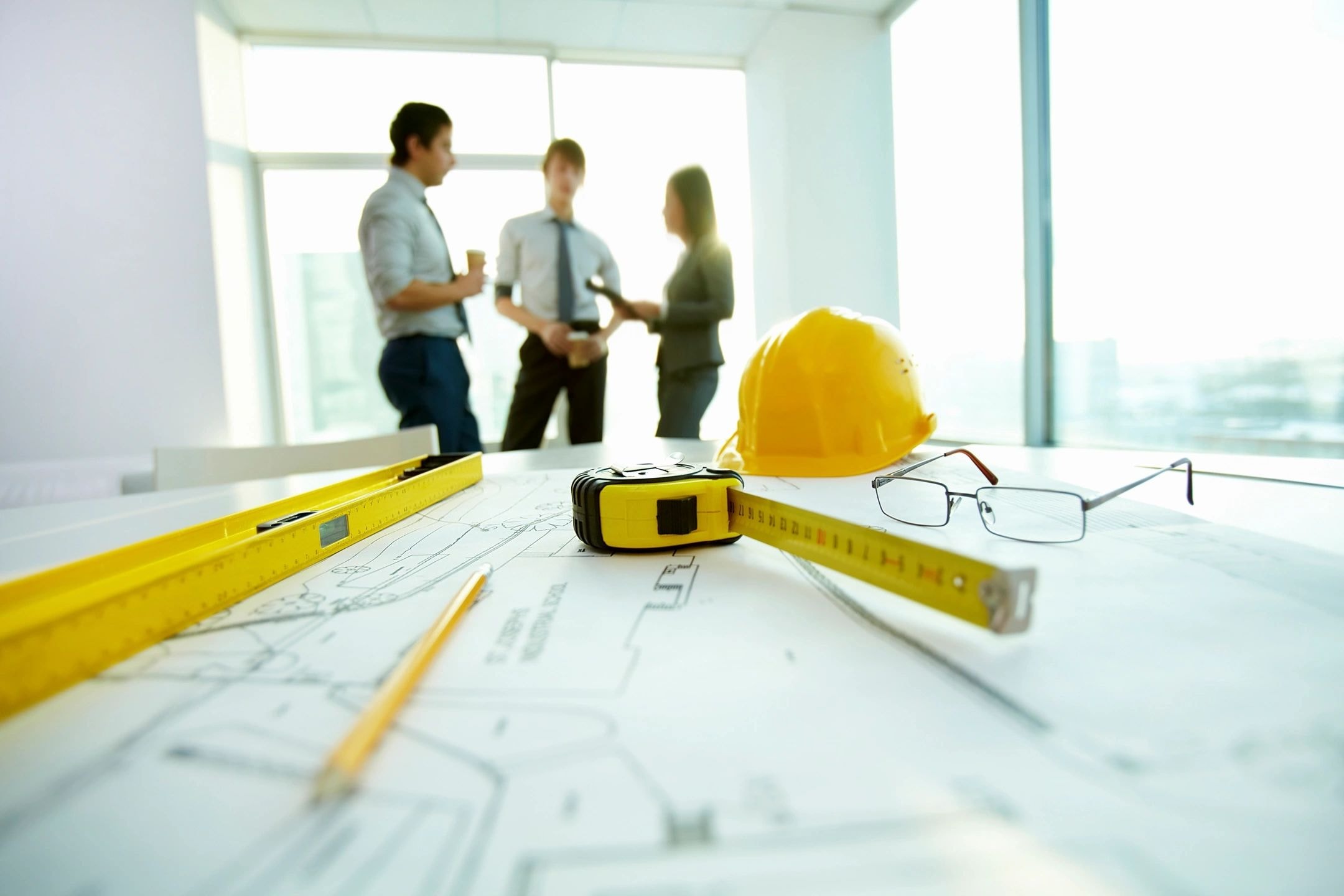 Team reviewing building plans